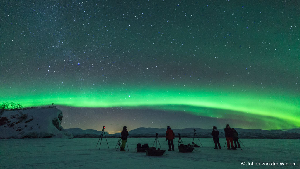 aurora shooting on the frozen lake near Abisko, Sweden