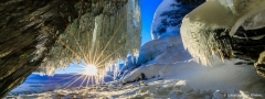 View from the ice cave...

made during the Arctic Aurora Chase 2019 #aac2019

After a spectacular night on the lake Torneträsk near Abisko with dancing auroras and the special pink ribbon, the next day the whole day began to get cloudy and cold. After a picture with pink shiny mountains we found this ice cave on the shore of the frozen lake, completely covered with icicles. It was hard to crawl in without breaking the ice or scratching yourself but finally I managed to find a spot where I could let the rising sun peaking throgh the icicles.

regards, Johan van der Wielen